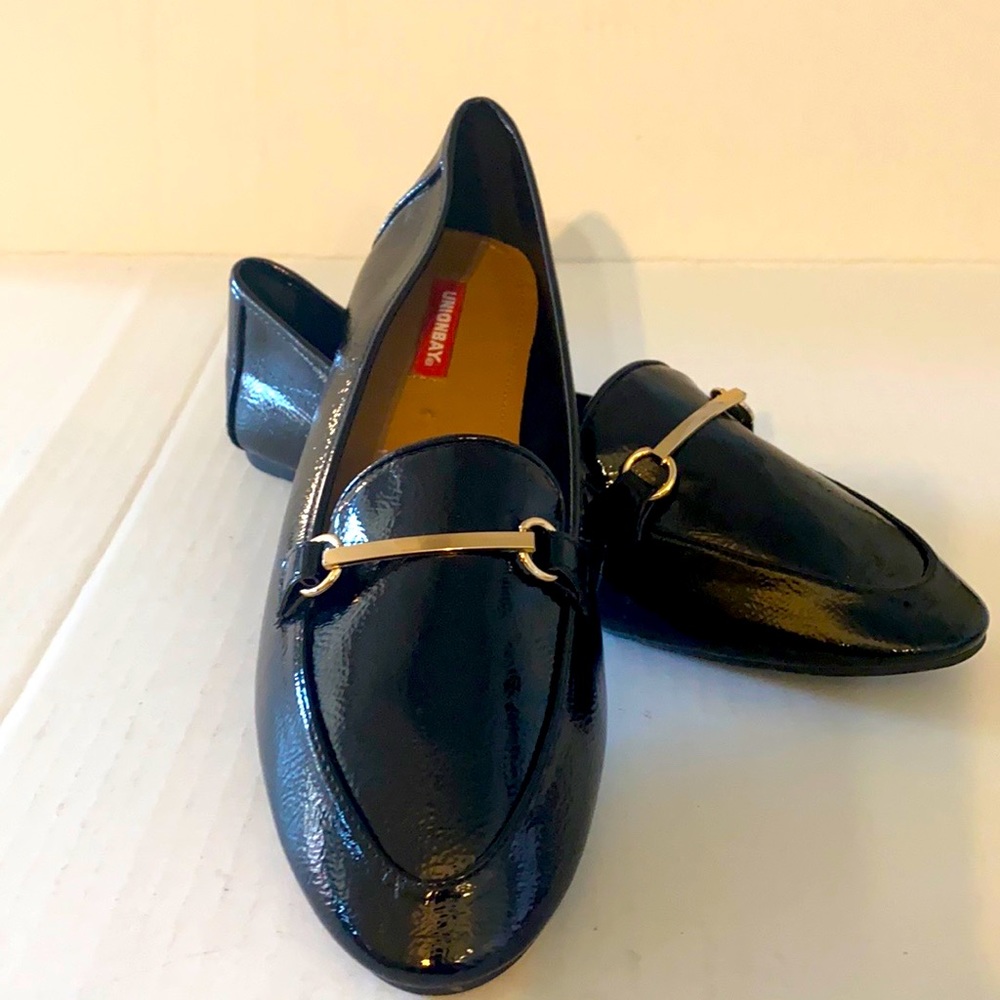 SOLD Patent leather loafer with horse-bit detail.